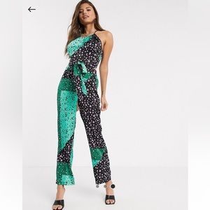 Halterneck  jumpsuit with floral patchwork in size US 4